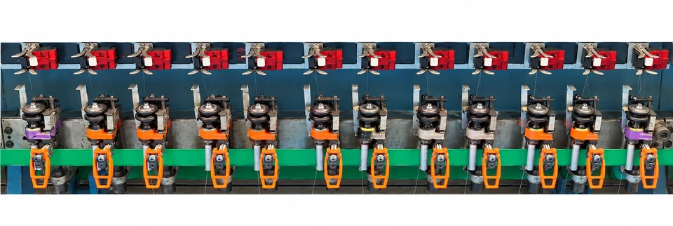 Panoramic view of the original magnetic spindle units along the texturing machine