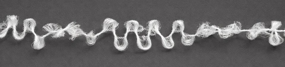Close up of air covered yarn made with 150f36 × 2 and 70 denier spandex
