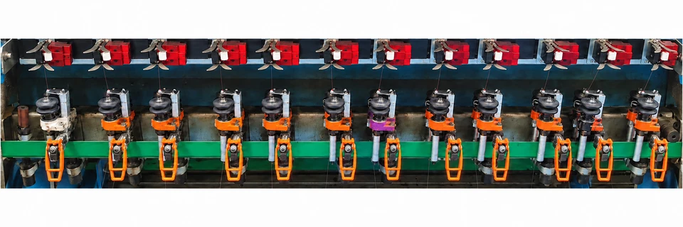 Panoramic view of the TSP modified magnetic spindle units along the texturing machine
