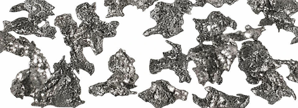 Magnified irregular metallic particle shapes